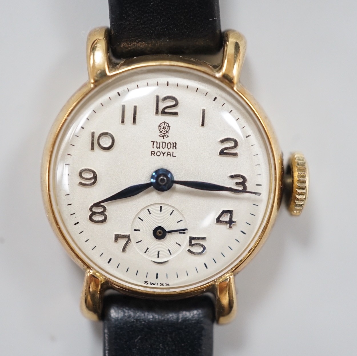 A lady's 1950's 9ct gold Tudor Royal manual wind wrist watch, with Arabic dial and subsidiary seconds, on associated leather strap, case diameter 20mm, with Tudor box.